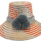 "Handmade Wayuu hat crafted from Iraca palm fibers, adorned with culturally significant pompoms, showcasing unique Wayuu craf