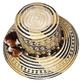 "Handmade Wayuu hat crafted from Iraca palm fibers, adorned with colorful pompoms, showcasing artisanal Colombian and Venezue