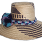 Side view of a boho chick straw hat in dark purple and natural tones