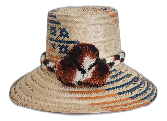 Handmade Wayuu straw hat with burnt orange and navy tribal design