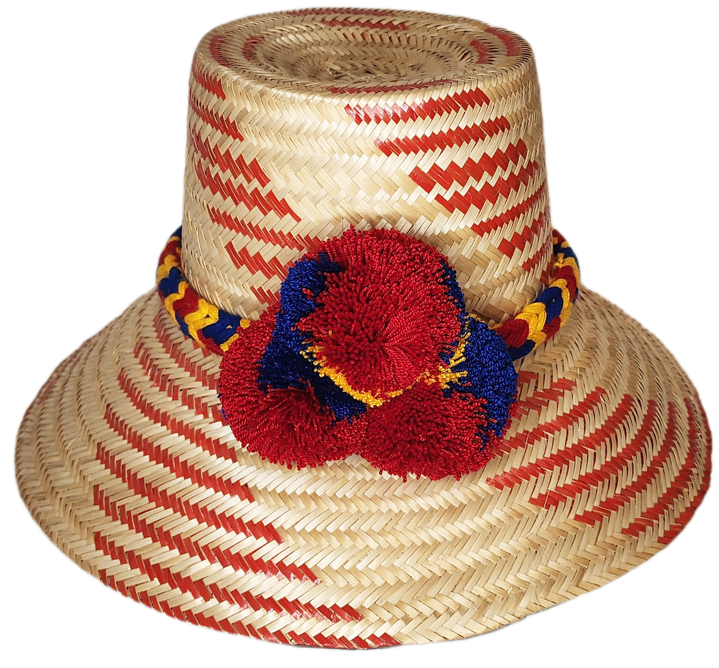 "Handmade Wayuu hat from Iraca palm fibers, adorned with culturally significant pompoms, adjustable size for various styles."