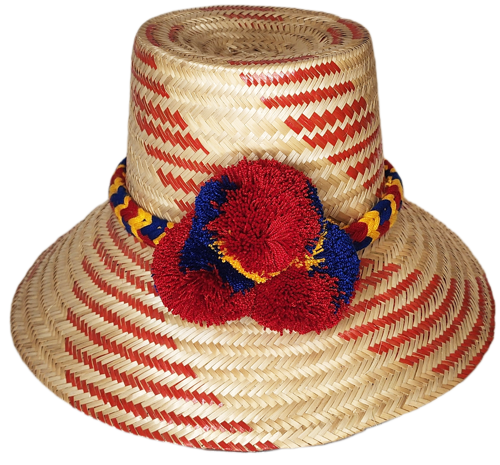 "Handmade Wayuu hat from Iraca palm fibers, adorned with culturally significant pompoms, adjustable size for various styles."