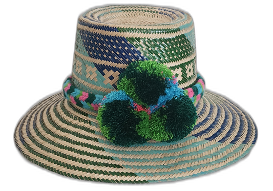 Handmade Wayuu straw hat with blue and green tribal patterns and pompoms