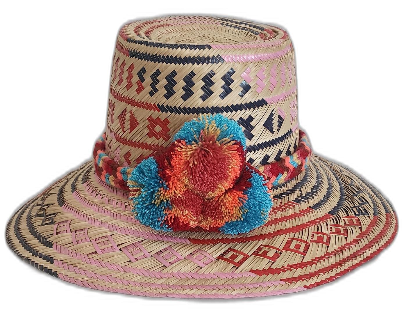 Handmade Wayuu straw hat with pink, red, and navy tribal designs
