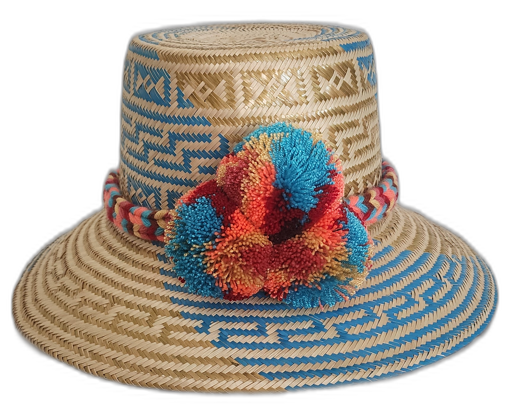 Handmade Wayuu straw hat with sky blue tribal pattern and bright pompoms