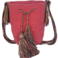 Boho-style Wayuu shoulder bag in coral pink, featuring bold artisan tassels and colorful handwoven strap — perfect for everyday expression.