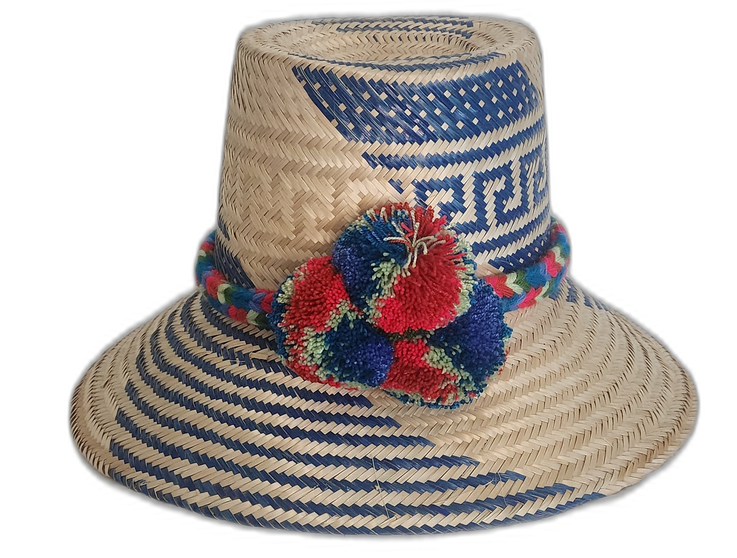 Handmade Wayuu straw hat with blue, red, and green pompoms