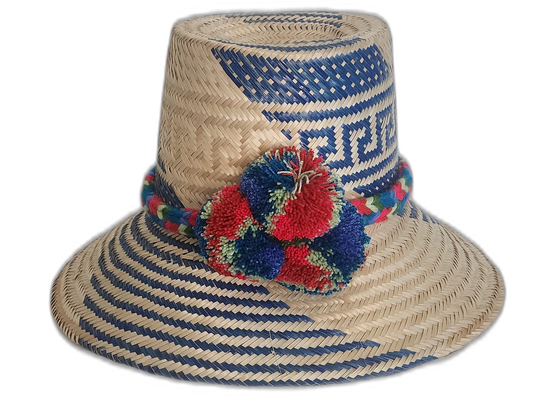 Handmade Wayuu straw hat with blue, red, and green pompoms