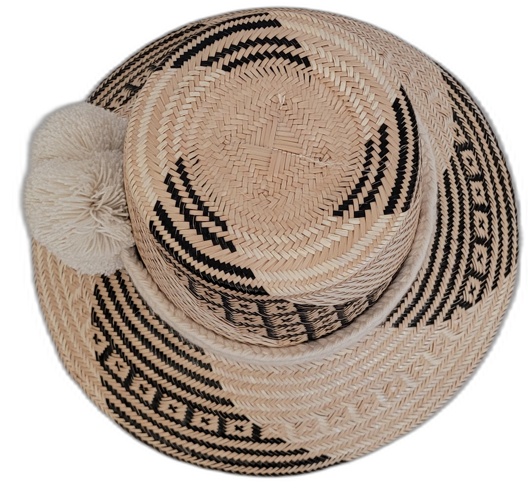 Boho Chic hat, Wayuu artisan-made, straw hat with soft cream pompoms and black-beige weave.

