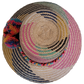 Boho Chick hat crafted by Wayuu artisans, complete with vibrant pompom trim.