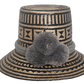 Handmade Wayuu straw hat with intricate black and natural geometric patterns, featuring a soft grey braided band and matching grey pom-poms.
