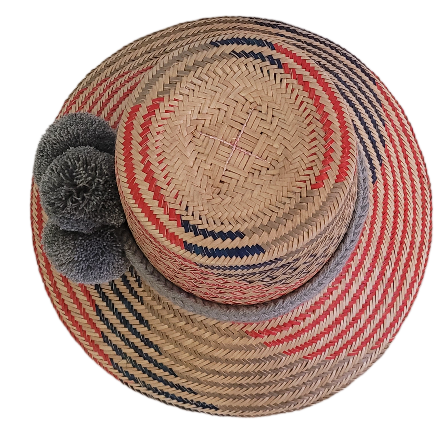 Colorful Wayuu hat for women, with vibrant diamond patterns and soft gray pom-poms — perfect for beach days, festivals, or casual summer wear.