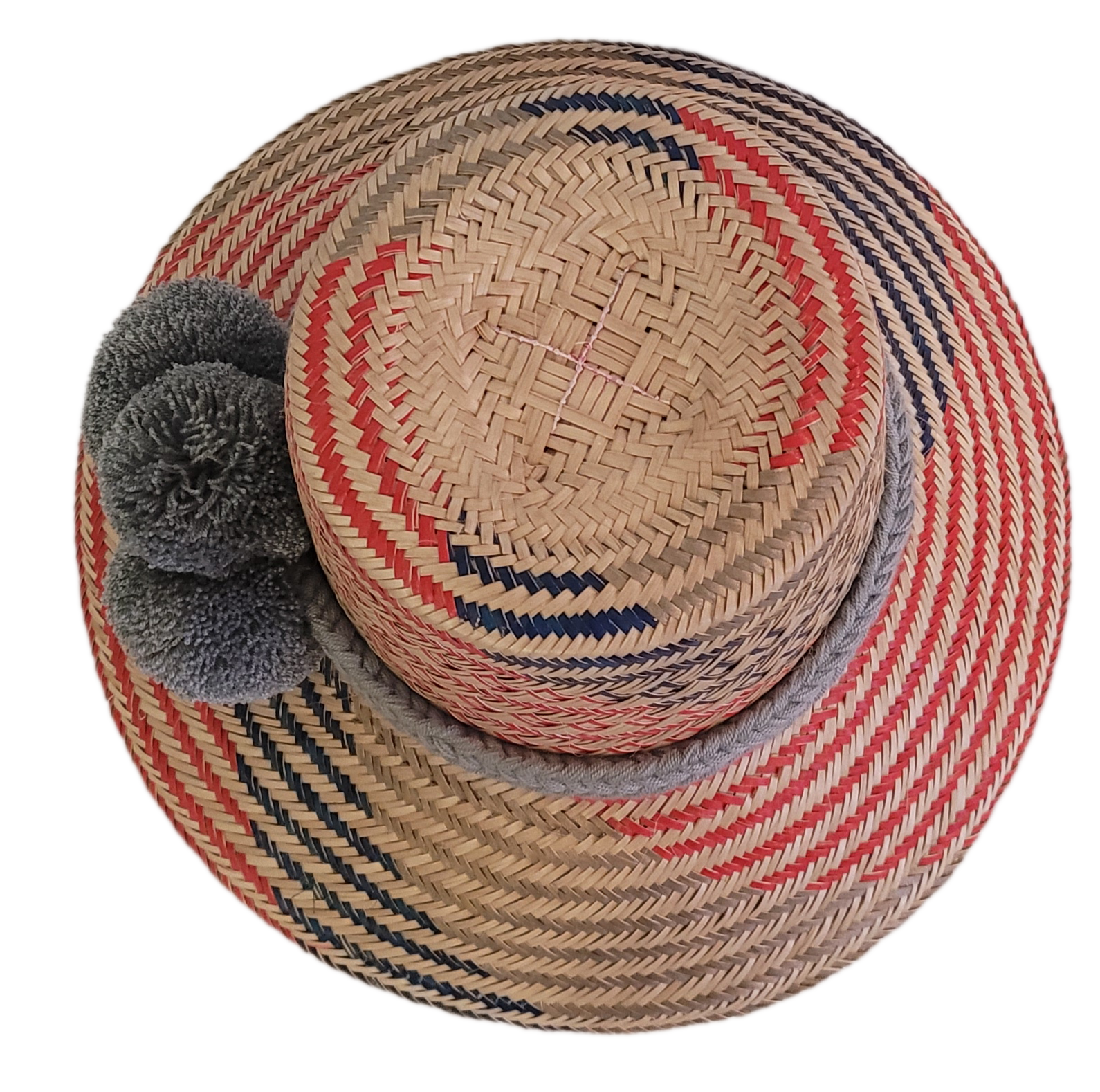 Colorful Wayuu hat for women, with vibrant diamond patterns and soft gray pom-poms — perfect for beach days, festivals, or casual summer wear.