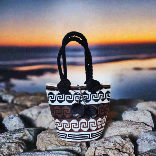 "Handmade Wuitusu Artisan Crochet Bag with vibrant, colorful patterns, showcasing Bohemian charm and Wayuu cultural artistry.