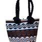 "Handmade Wuitusu Artisan Crochet Bag with vibrant, colorful patterns, showcasing Bohemian charm and Wayuu cultural artistry.