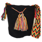 "Handmade Wuitusu crochet bag crafted by Wayuu women, featuring vibrant patterns and colors symbolizing Wayuu culture."