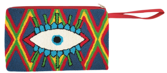 "Handmade Wuitusu Needle Punch Clutch with vibrant, colorful patterns by Wayuu artisans, featuring a zip closure and lined in