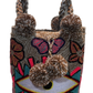 "Handmade Wuitusu Punch Needle Bag with vibrant colors and a boho design, crafted by Wayuu artisans."