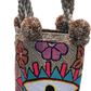 "Handmade Wuitusu Punch Needle Bag with vibrant colors and a boho design, crafted by Wayuu artisans."