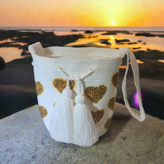 "Handmade Wuitusu Wayuu crochet bag featuring vibrant colors, geometric patterns, and a 19-inch woven strap for crossbody wea