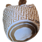 "Handmade Wuitusu Wayuu crochet bag with vibrant patterns, short handle, supporting fair trade and Wayuu community."
