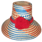"Handmade Wuitusu Wayuu Hat crafted from Iraca palm, adorned with symbolic pompoms, offering adjustable fit and cultural sign