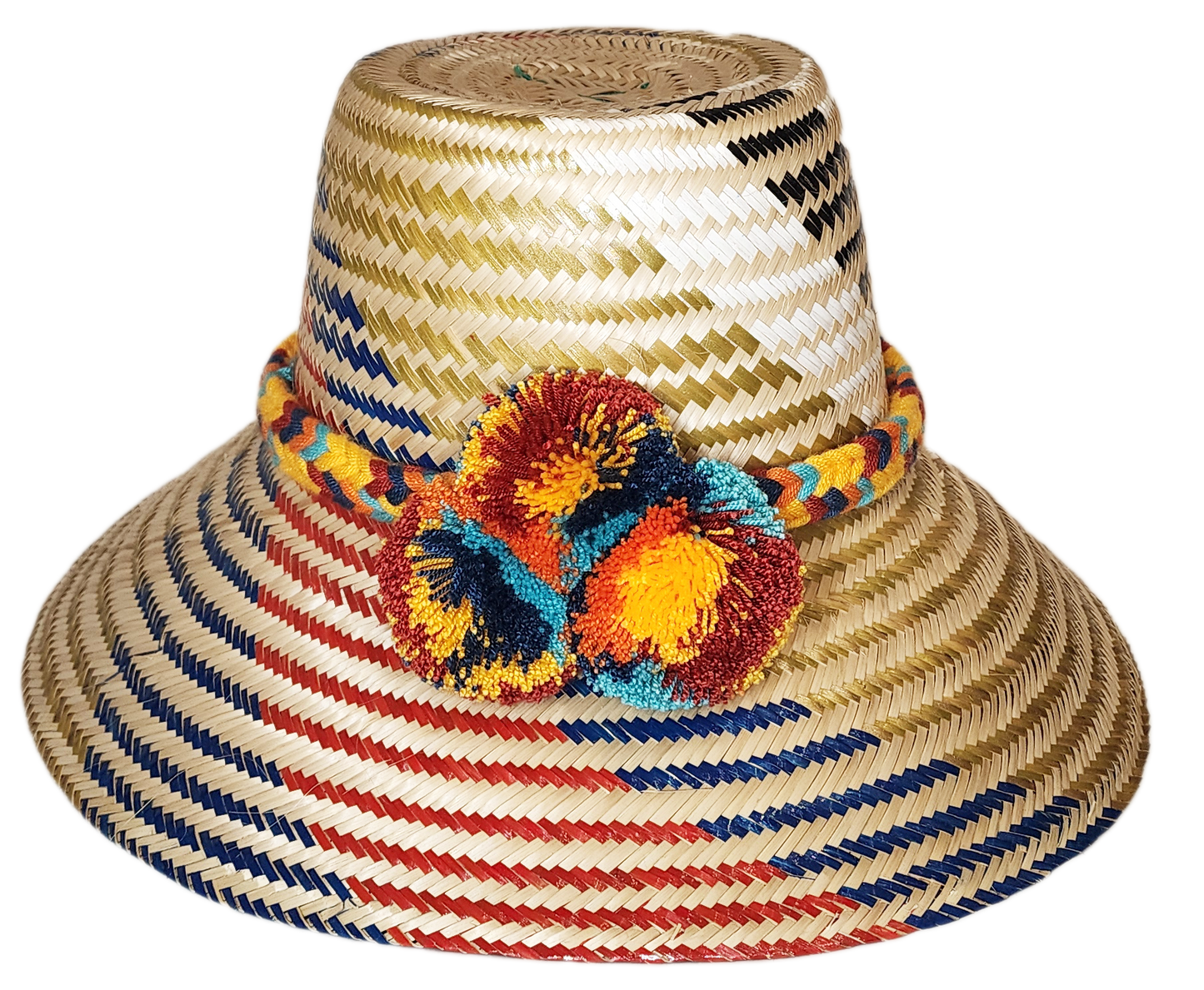 "Handmade Wuitusu Wayuu hat crafted from Iraca palm fibers, adorned with colorful pompoms, reflecting rich Wayuu tribal cultu