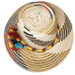 "Handmade Wuitusu Wayuu hat crafted from Iraca palm fibers, adorned with colorful pompoms, reflecting rich Wayuu tribal cultu