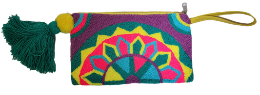 "Handmade Wuitusu Wayuu Needle Punch Clutch with vibrant, colorful patterns, zippered closure, and fabric lining, supporting 