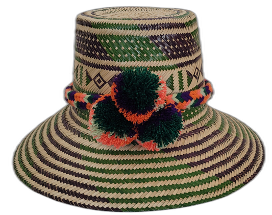 Handmade Wayuu straw hat with green, purple, and orange pompoms.Artisan boho straw hat with multicolor zigzag pattern and bold pompoms

