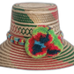Kennedy handmade Wayuu hat with green and red pattern and multicolor pompoms in Bohemian colors

