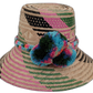 Laila handmade Wayuu straw hat with pink, green, and black weave and bright pompoms

