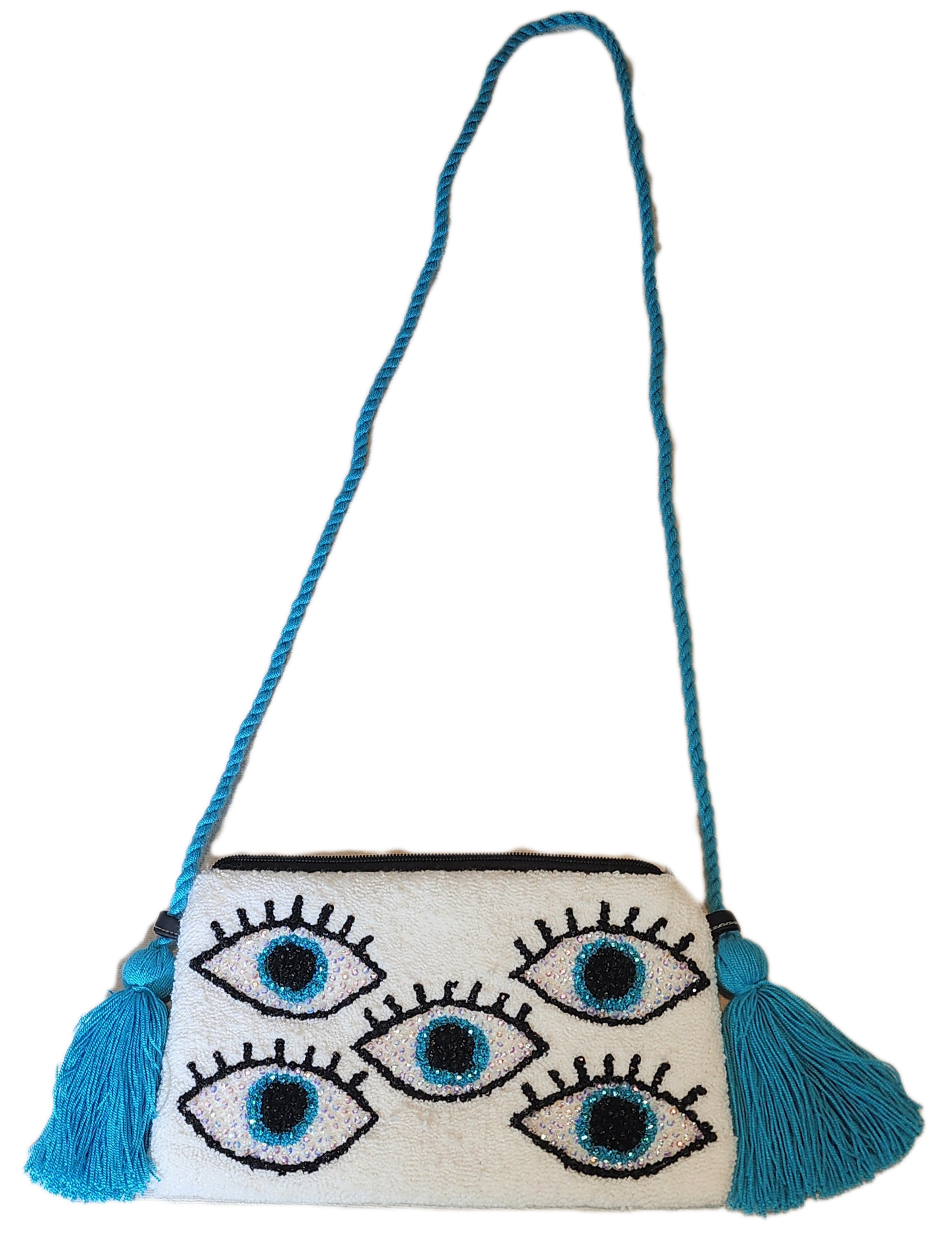 Bohemian Lia fluffy Wayuu clutch with crystal embellishments and blue handle