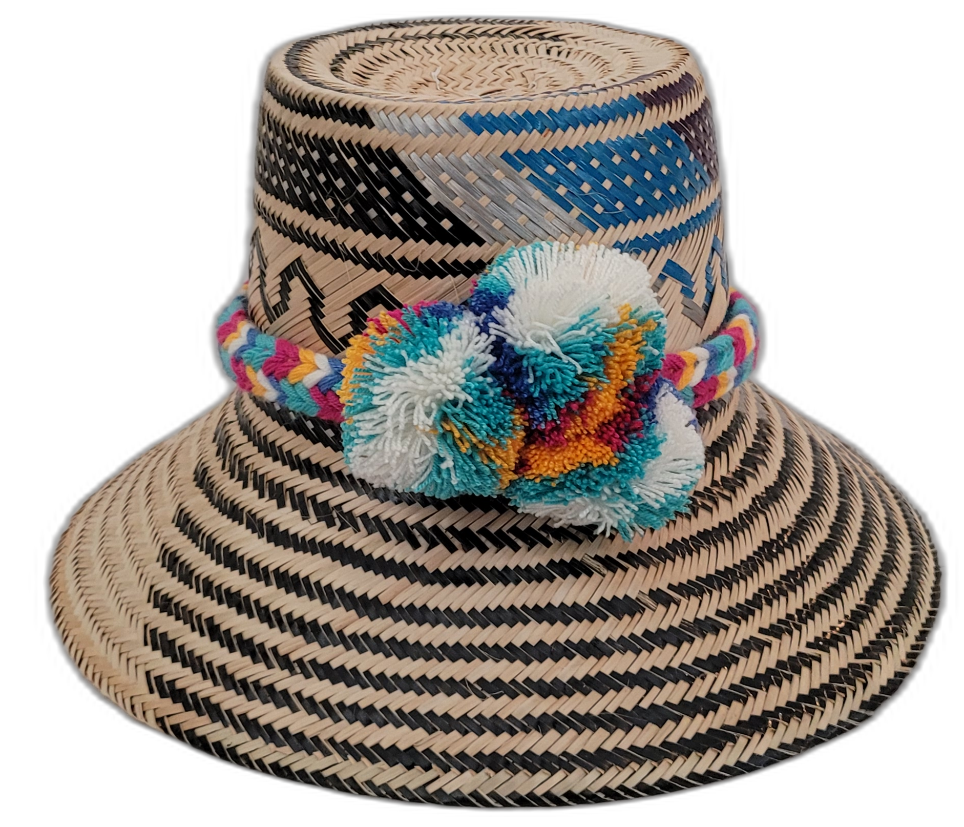 Lila handmade Wayuu straw hat with black, natural, and blue weave and multicolor pompoms

