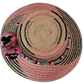 Lilah bohemian handmade hat crafted from Iraca palm with unique pink and black patterns

