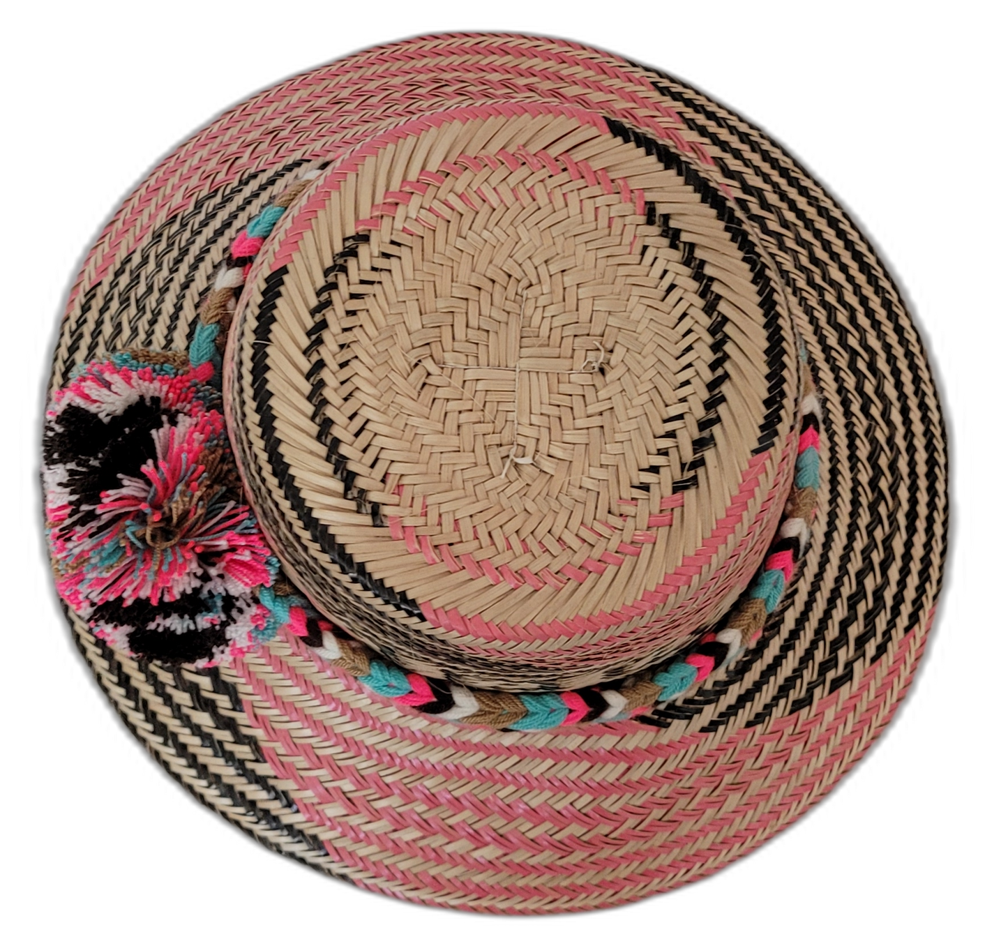 Lilah bohemian handmade hat crafted from Iraca palm with unique pink and black patterns


