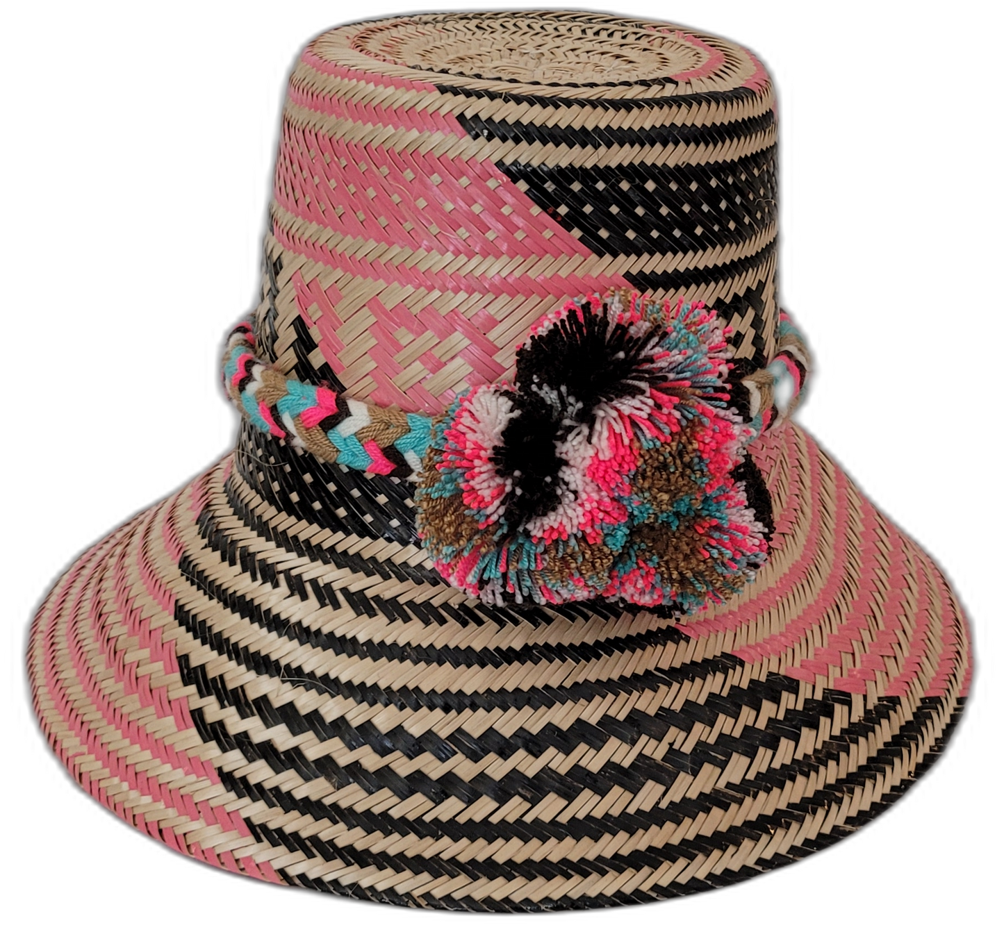 Lilah handmade Wayuu hat with pink, black, and natural palm patterns and vibrant pompoms

