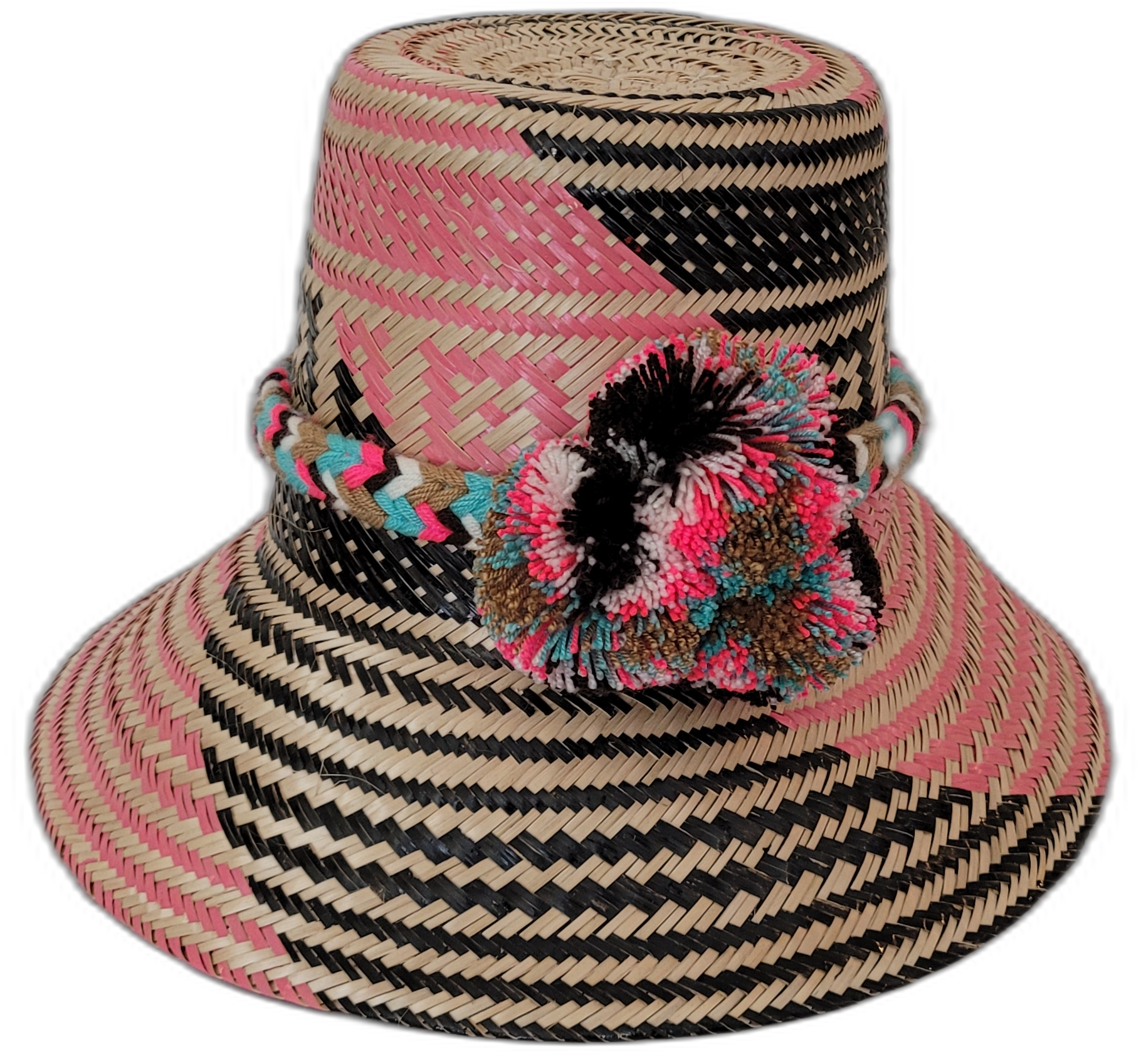 Lilah handmade Wayuu hat with pink, black, and natural palm patterns and vibrant pompoms

