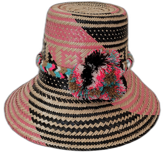 Lilah handmade Wayuu hat with pink, black, and natural palm patterns and vibrant pompoms

