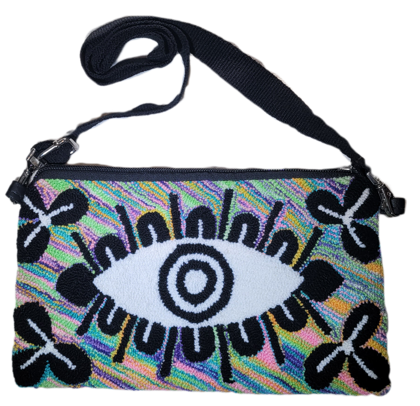 Lilliana handmade Wayuu punch needle adjustable purse with rainbow eye design

Bohemian Lilliana Wayuu adjustable purse with colorful punch needle crochet

Handmade Wayuu Lilliana purse, artisan punch needle design with eye pattern

Boho chic Lilliana punch needle purse, Wayuu handmade crochet with strap