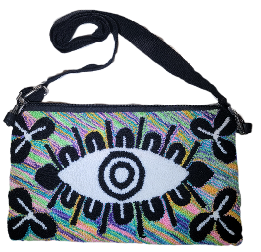 Lilliana handmade Wayuu punch needle adjustable purse with rainbow eye design

Bohemian Lilliana Wayuu adjustable purse with colorful punch needle crochet

Handmade Wayuu Lilliana purse, artisan punch needle design with eye pattern

Boho chic Lilliana punch needle purse, Wayuu handmade crochet with strap