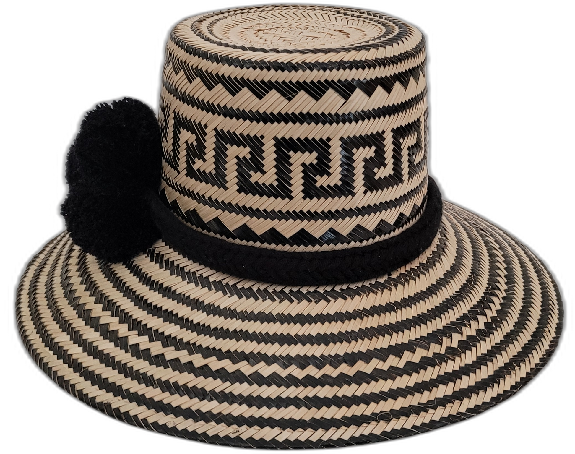 Artisan Wayuu hat Lilly with bold black geometric pattern and symbolic black pompom

