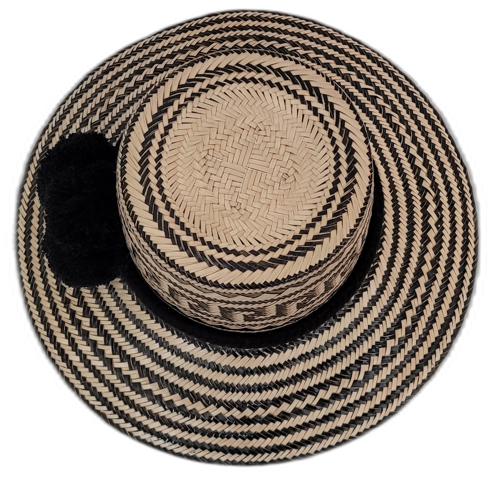 Traditional Wayuu hat Lilly in black and natural tones with black pompom detail

