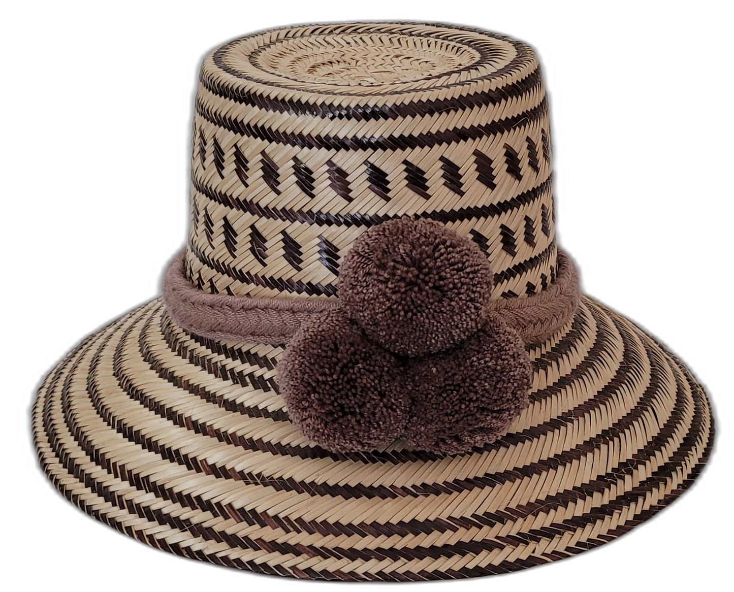 Lola handmade Wayuu straw hat in dark brown and natural palm with matching pompoms

