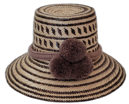 Lola handmade Wayuu straw hat in dark brown and natural palm with matching pompoms

