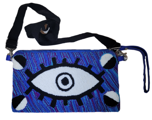 Makenzie handmade Wayuu punch needle adjustable purse with blue and eye design

Bohemian Makenzie Wayuu adjustable purse with vivid punch needle crochet