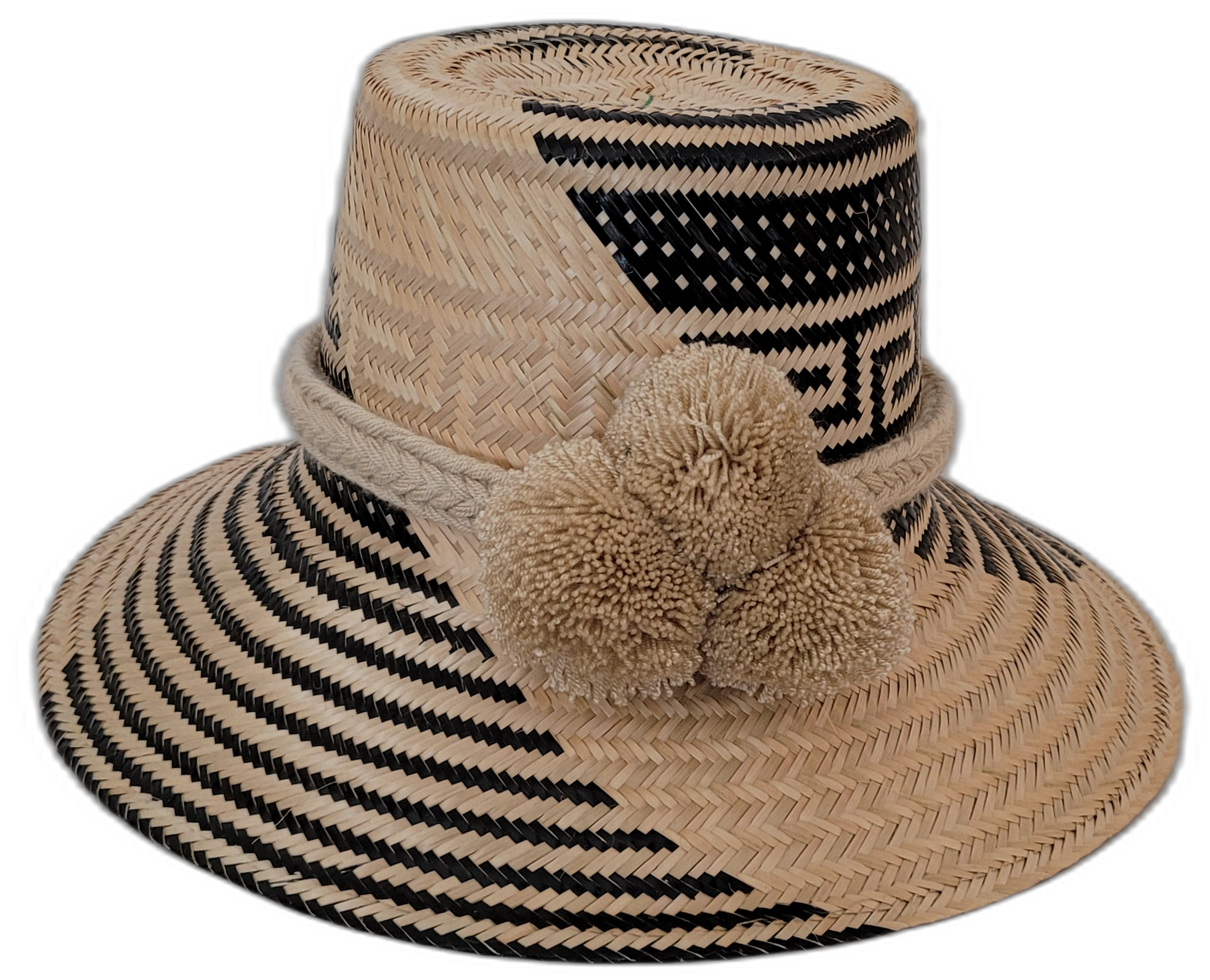 Margot handmade Wayuu straw hat with black geometric weave and beige pompoms

