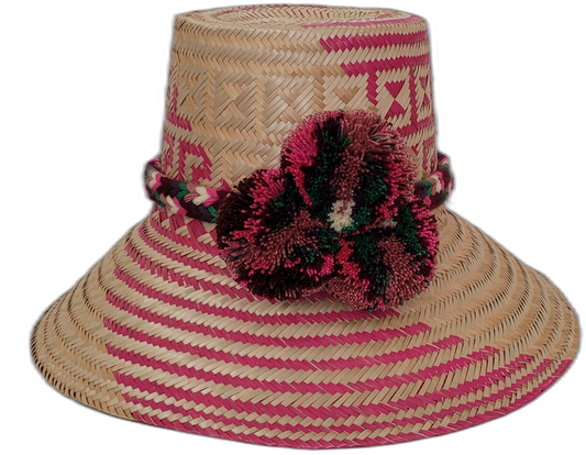 Marley handmade Wayuu straw hat with magenta weave and multicolor pompoms

