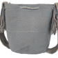 Bohemian Wayuu crochet bag in subtle gray tones with matching tassels and strap — handmade elegance in a colorful world.