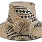 Handmade Wayuu straw hat in black and natural with beige pompoms